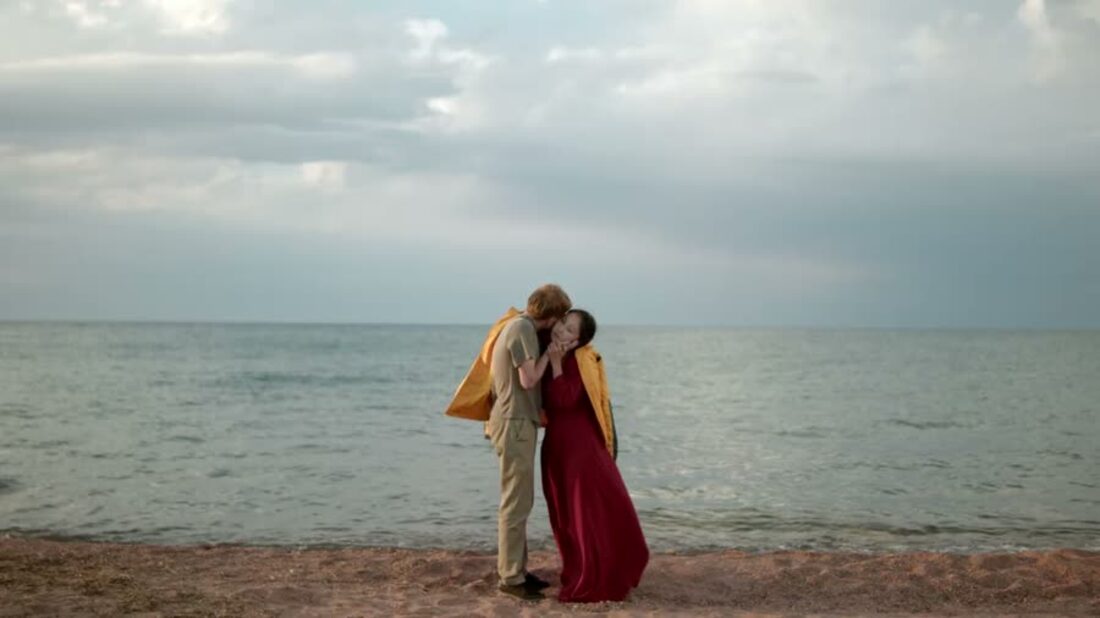 Live-action still — Alex and the woman by Issyk-Kul lake